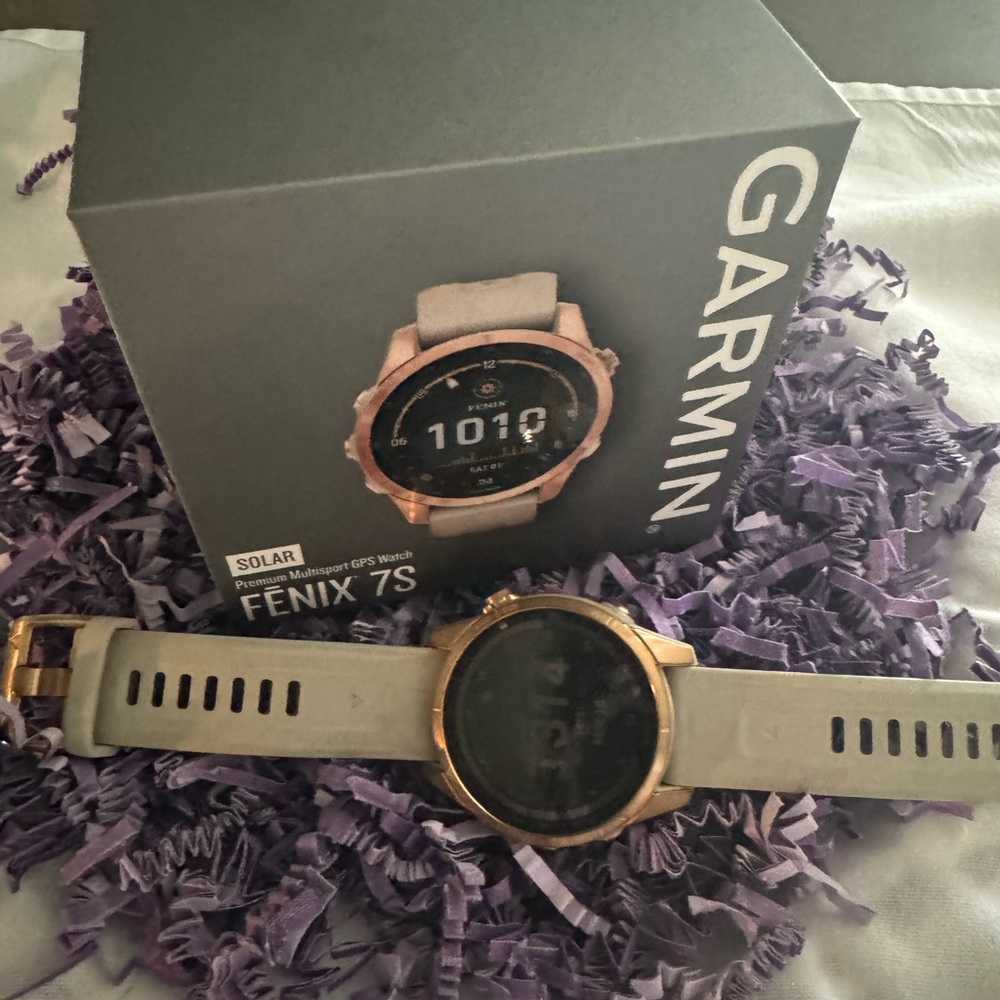 Ladies Rose Gold Garmin Fenix 7S.
